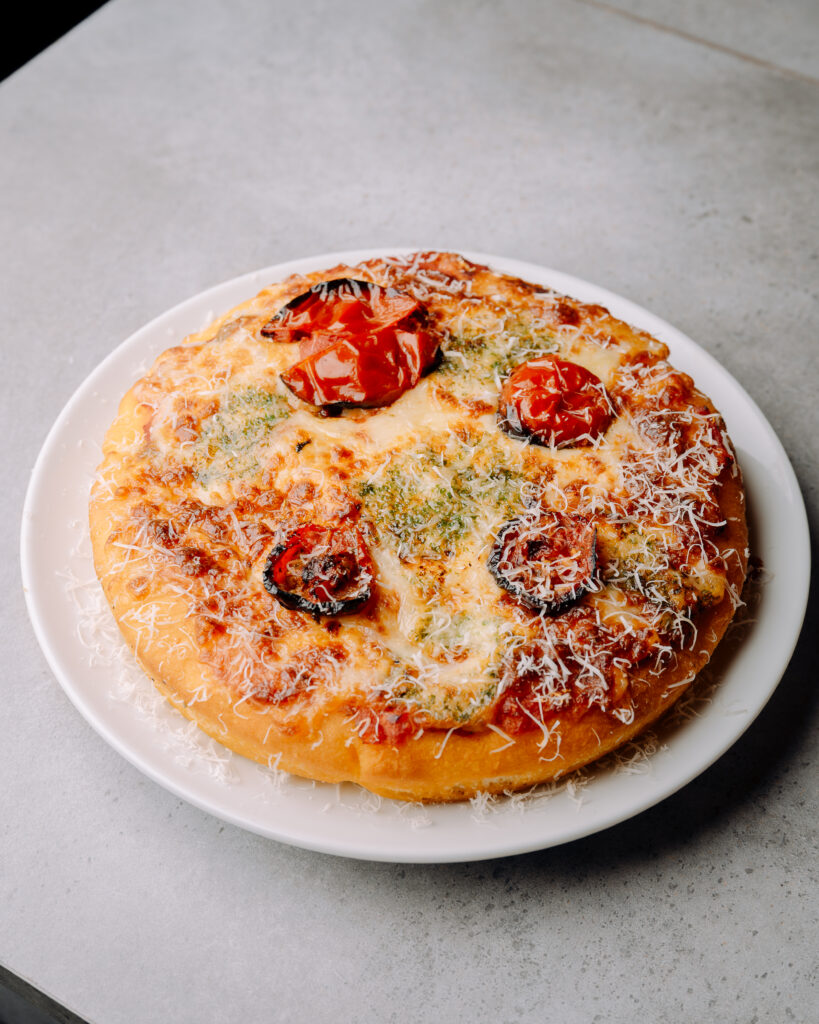 Focaccia Marinara at Nesso Coffee Leeds with tomato focaccia, garlic butter, cheddar and jalapeño