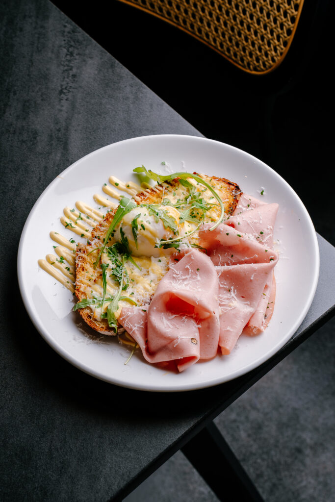 Egg and Ham Benedict with toasted pugliese bread, baked poached egg, ricotta and hollandaise at Nesso Coffee Leeds